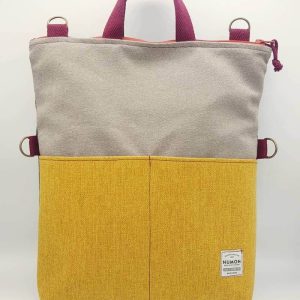 Bolso-mochila mostaza y gris de tapicería reciclada