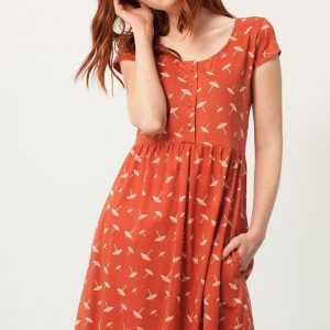 Vestido oversize con botones terracota estampado sombrillas